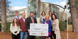 Enmarket Savannah Bridge Run Presents Donation to Nancy N. and J.C. Lewis Cancer and Research Pavilion