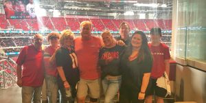 Sales Manager Hosts Repeat Customers at Falcons Game