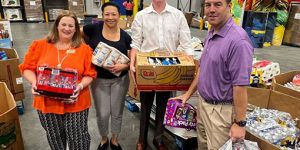 Chamber Ambassadors and Staff Tour Second Harvest, Pack 144 Food Boxes to Fight Hunger