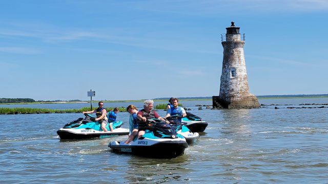 Jet Skis in front of the Cockspur Lighthouse