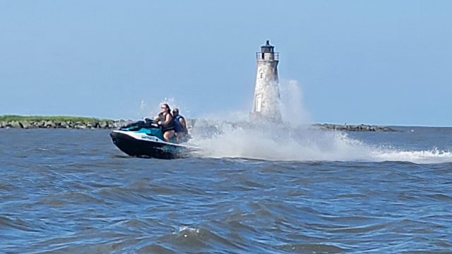 Jet Ski Rental Splashing in front of the Cockspur Lighthouse